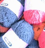 balls of strong pink and blue wool