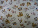 Nursery fabric with rocking horse, drum, pram motif at Lee Nova Craft & Haberdashery St Marys (Sydney) baby fabric with rocking horses, drum, pram swatch