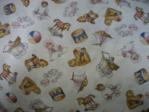 baby fabric with rocking horses, drum, pram swatch