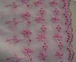Pink stitching on White Fabric Brodarie Anglaise